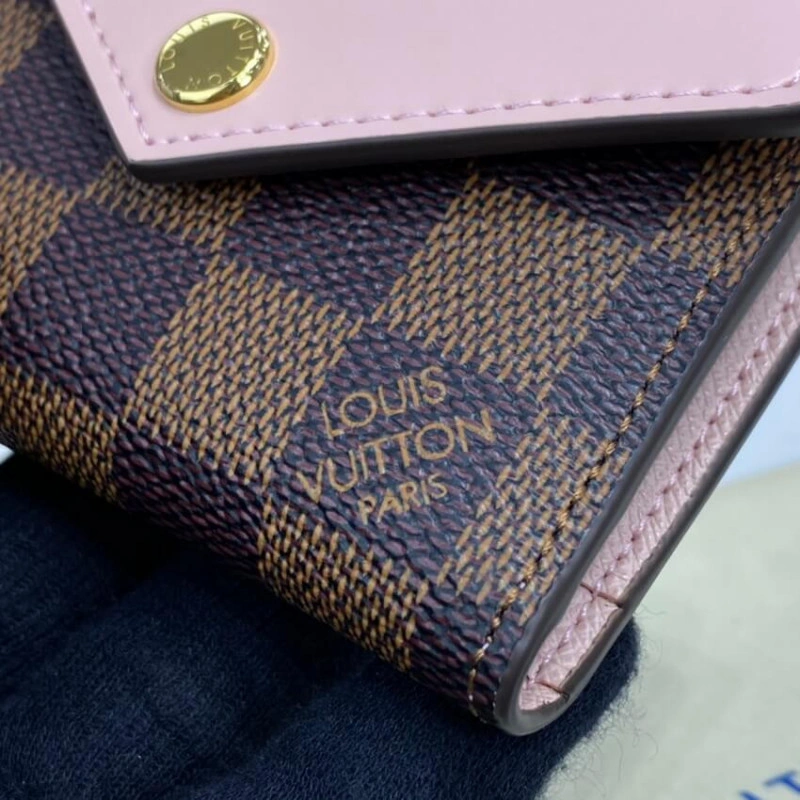 Zipped co Louis Vuitton Damier Ebene Zoe Wallet Pink - Image 4