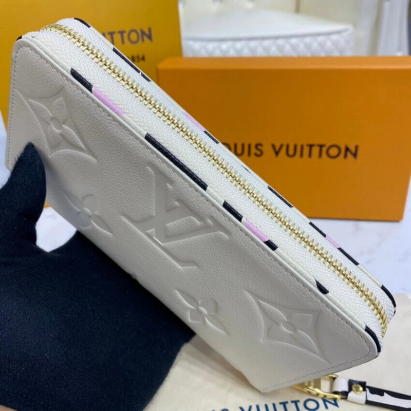 Louis Vuitton Monogram Empreinte Leather with Animal-Print Zippy Wallet Cream - Image 5