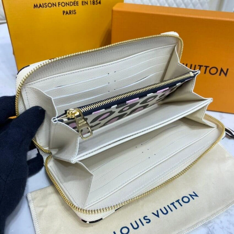 Louis Vuitton Monogram Empreinte Leather with Animal-Print Zippy Wallet Cream - Image 9